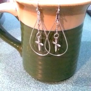 Silver plated dangling cross earrings